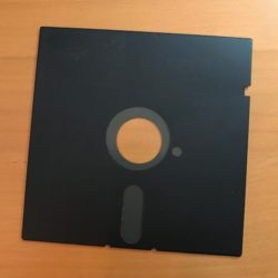Floppy diskette with no label on a desktop
