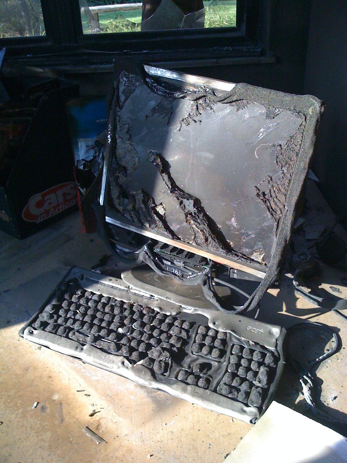A desktop computer destroyed by fire